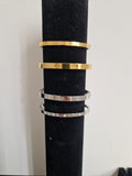 Half Stone Bangle in Yellow Gold
